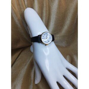 Vintage Timex Indiglo Women's Easy Read Gold Tone Watch with Black Leather Band